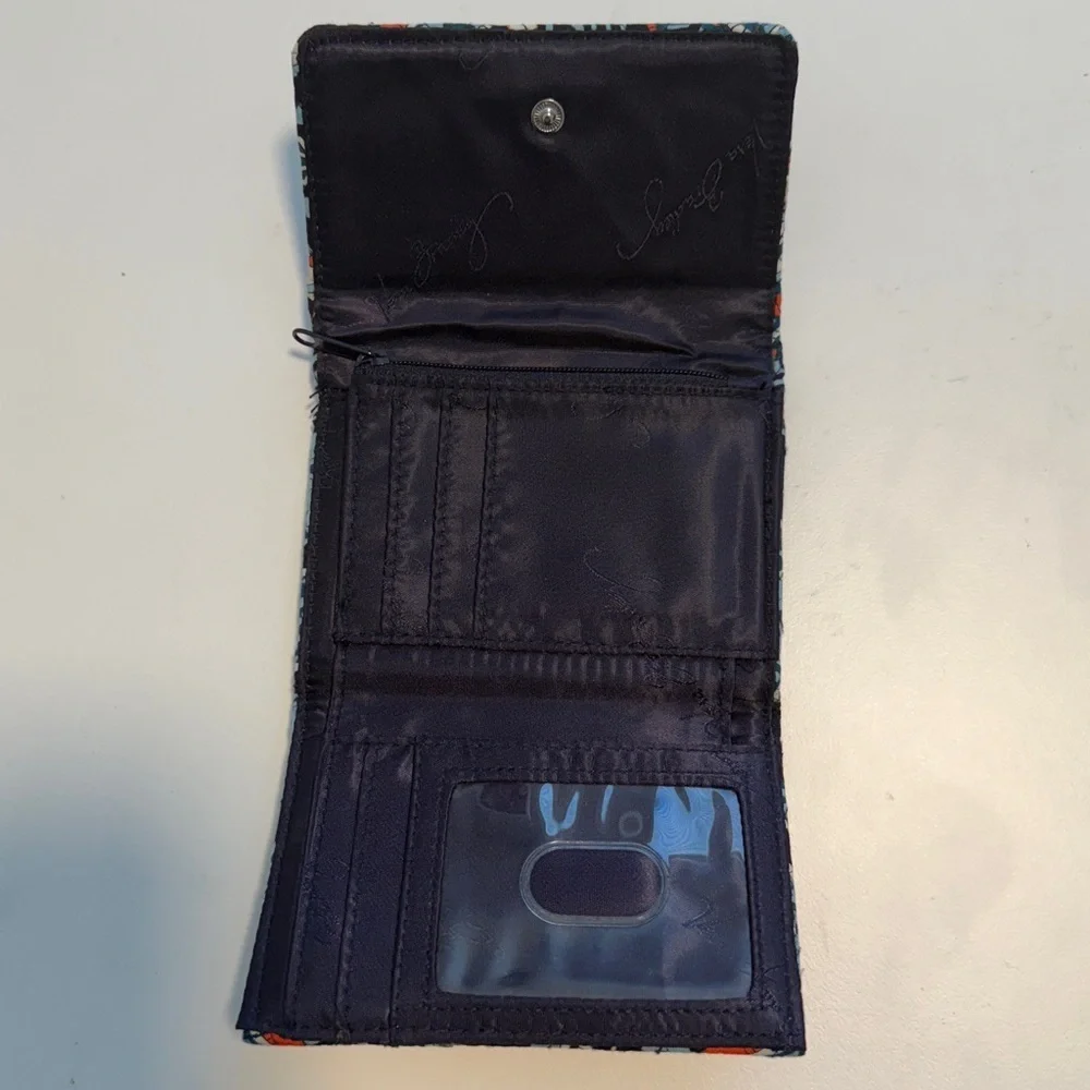 Vera Bradley RFID floral quilted trifold Wallet.